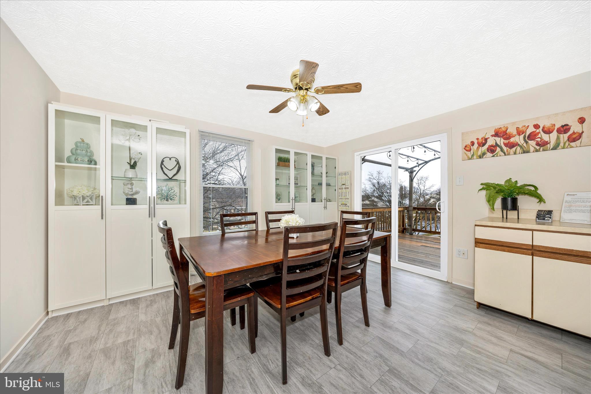 3 Contour Road Mount Airy, MD 21771 - Photo 15 of 54 a view of a dining room with furniture window and wooden floor