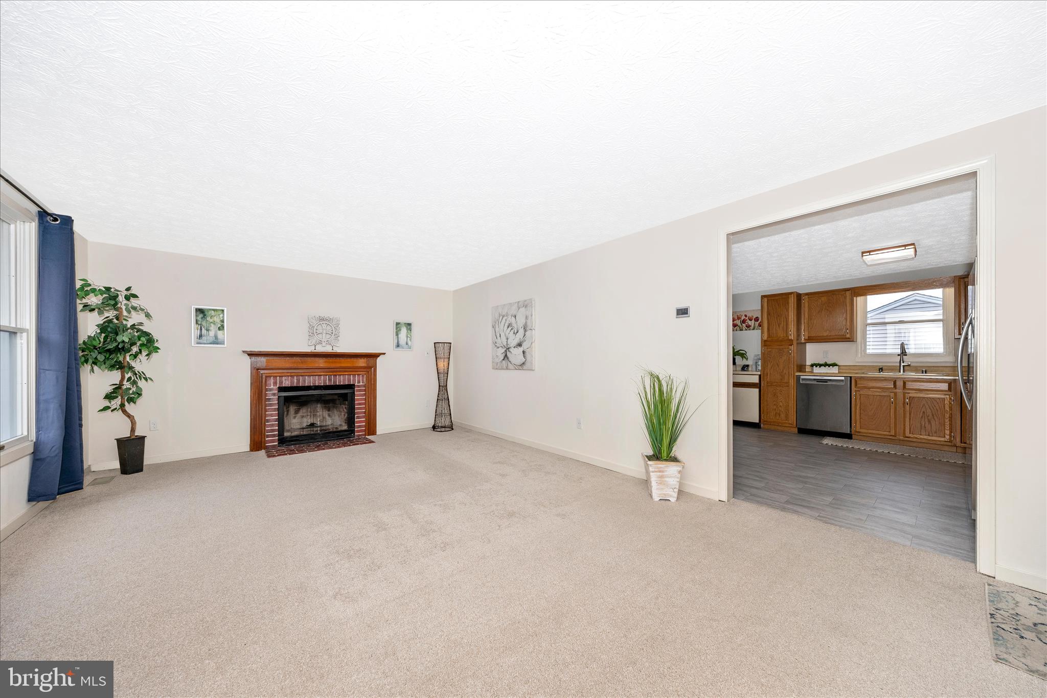 3 Contour Road Mount Airy, MD 21771 - Photo 3 of 54 a view of a livingroom with furniture and a fireplace