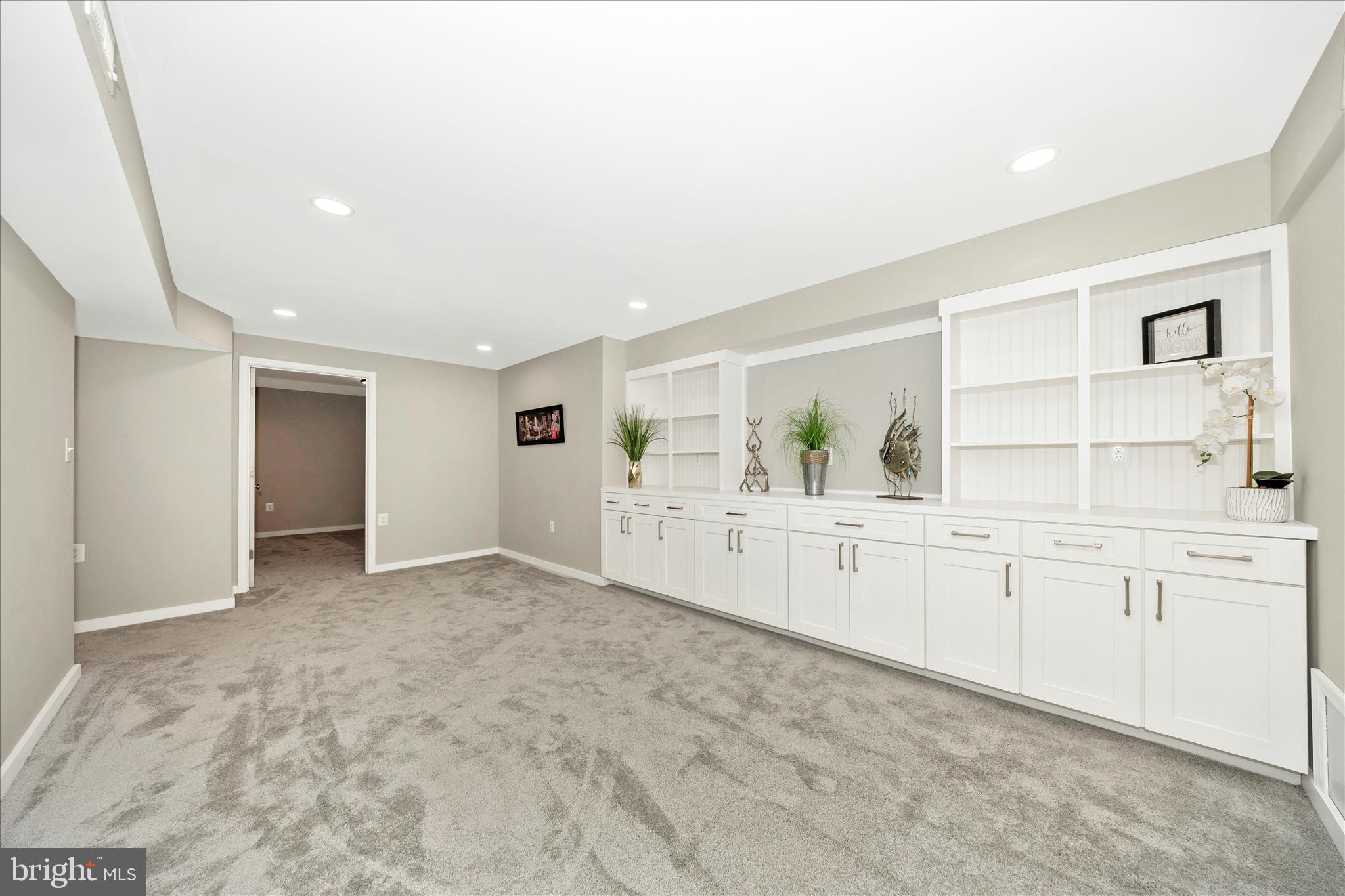 3 Contour Road Mount Airy, MD 21771 - Photo 32 of 54 a large white kitchen with white cabinets and white appliances