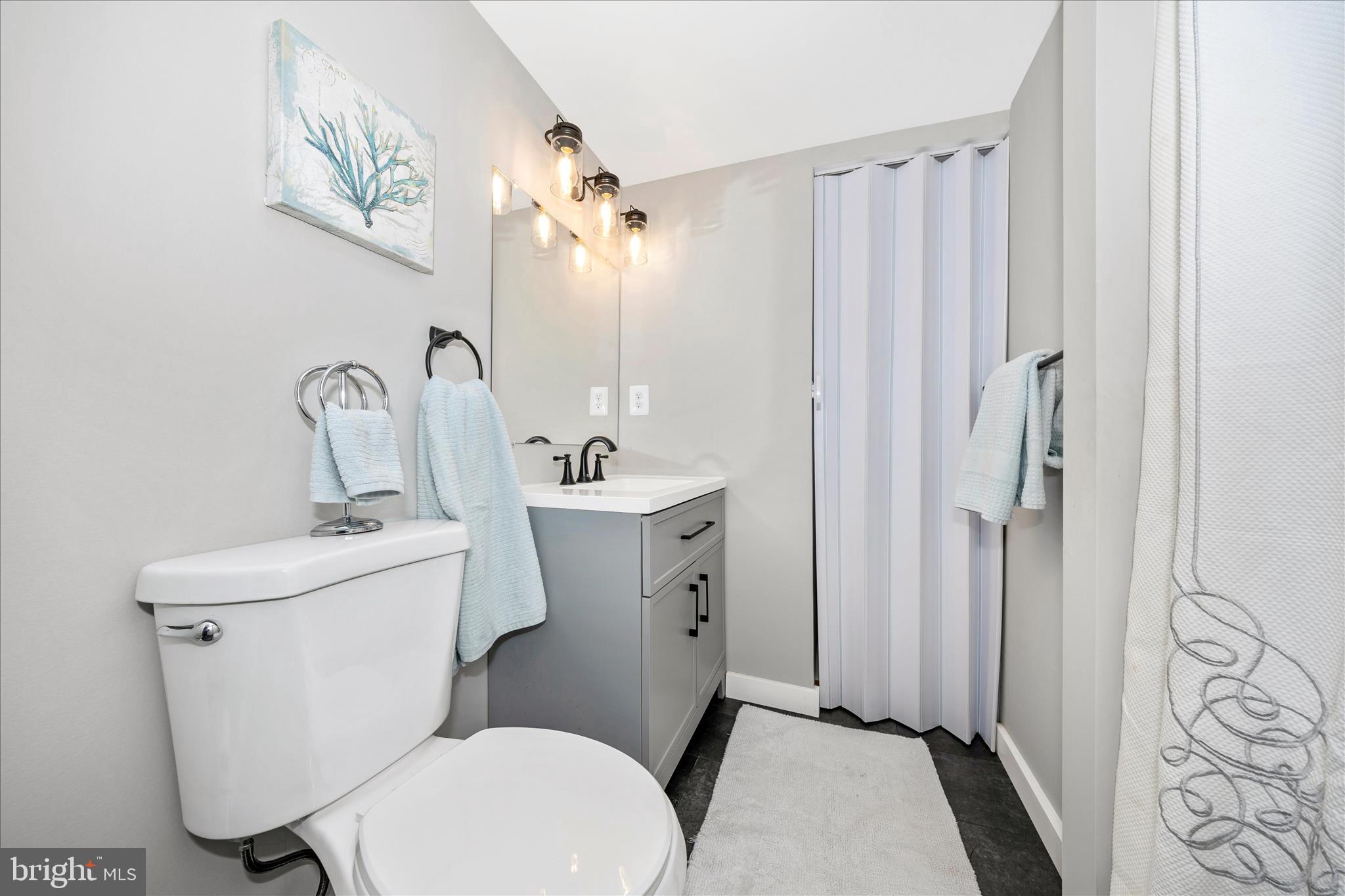 3 Contour Road Mount Airy, MD 21771 - Photo 35 of 54 a bathroom with a sink toilet and shower