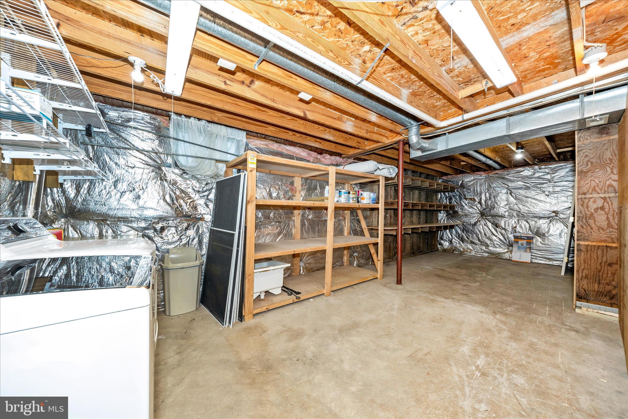 3 Contour Road Mount Airy, MD 21771 - Photo 38 of 54 a view of a room with racks on the wall