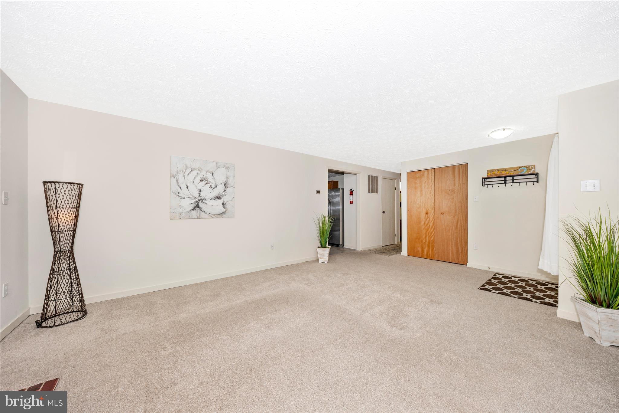 3 Contour Road Mount Airy, MD 21771 - Photo 4 of 54 a view of an empty room with a window