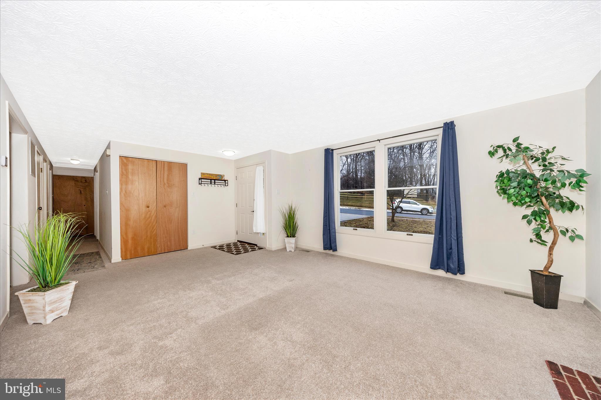 3 Contour Road Mount Airy, MD 21771 - Photo 5 of 54 a view of a house with a yard and potted plants