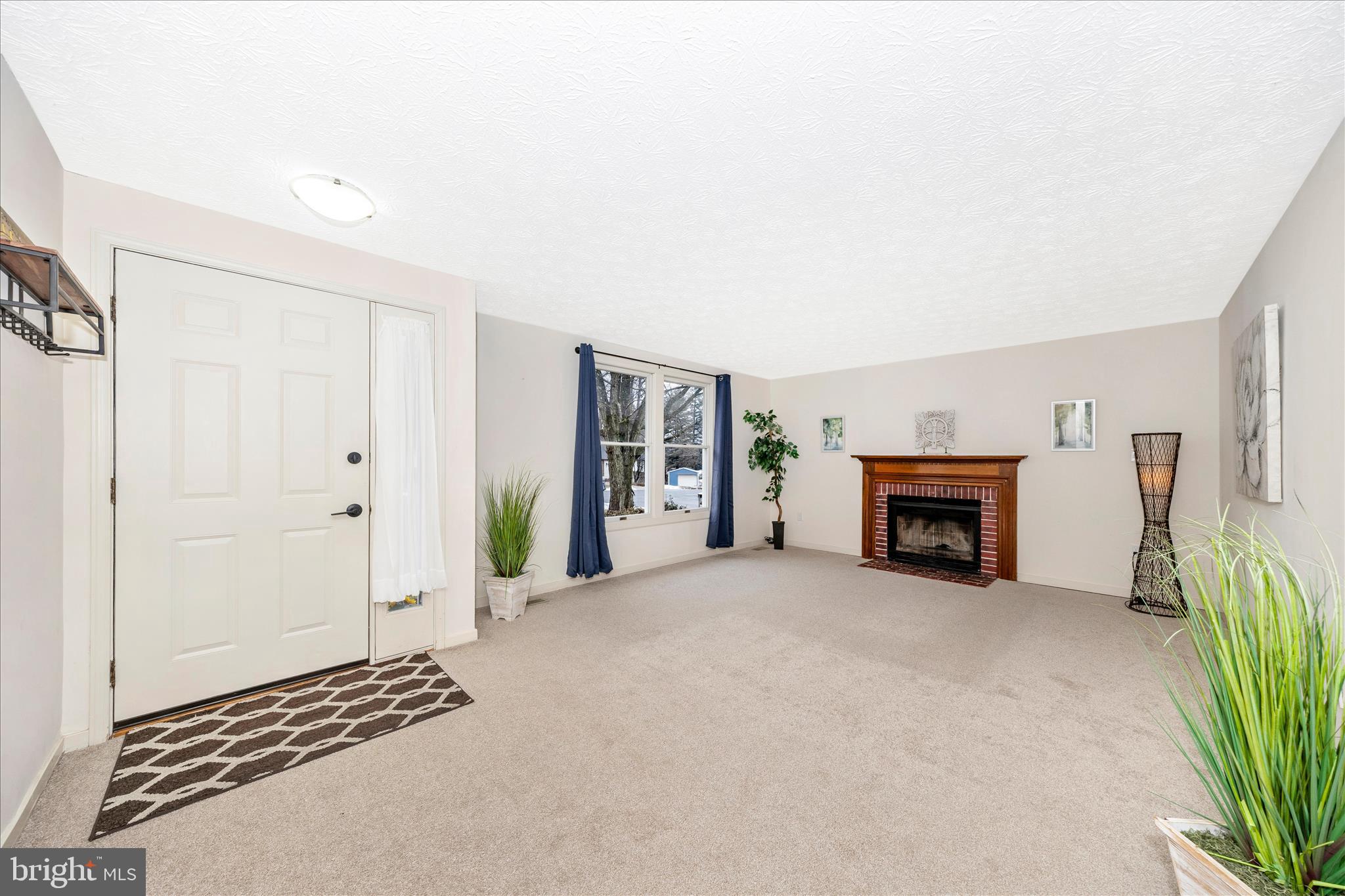 3 Contour Road Mount Airy, MD 21771 - Photo 6 of 54 a view of livingroom with furniture and fireplace