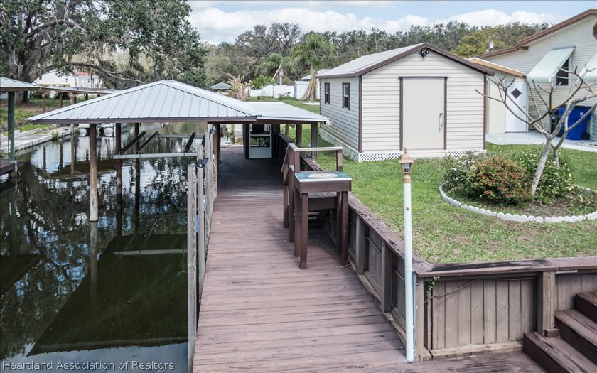 9 Mary Bell Landing Road Sebring, FL 33876 - Photo 4 of 24 Dock, Seawall and Boathouse