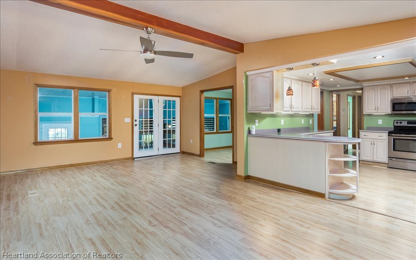 9 Mary Bell Landing Road Sebring, FL 33876 - Photo 7 of 24 Kitchen and living room view