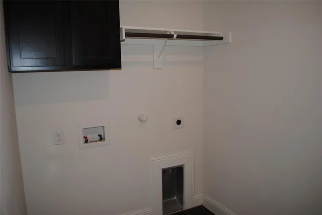 a room with a bench and a window