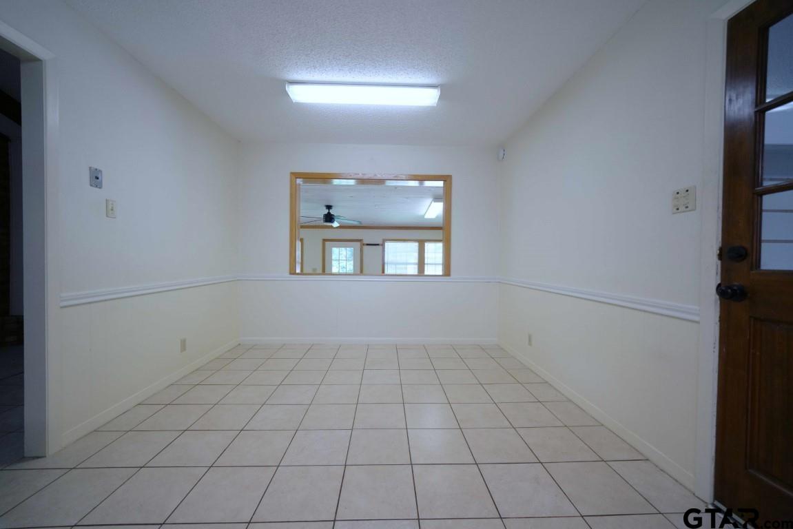 4505 Inverness Drive Tyler, TX 75703 - Photo 17 of 46 a view of an empty room with a window