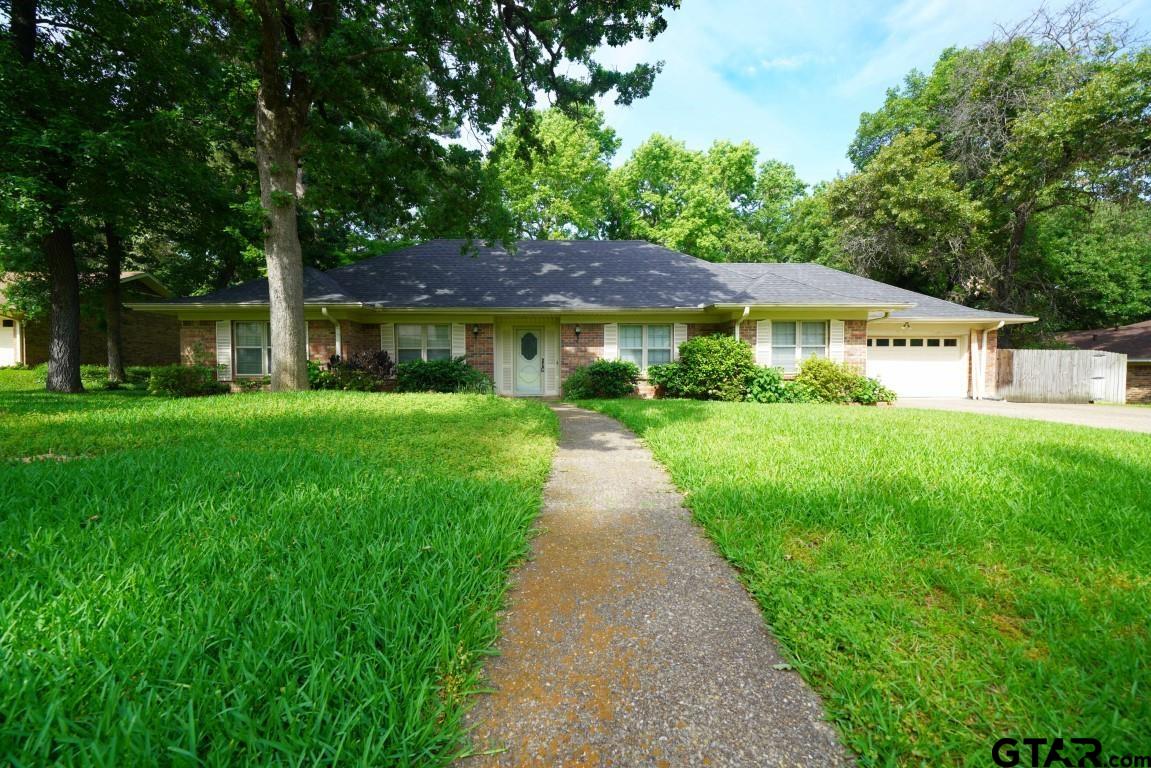 4505 Inverness Drive Tyler, TX 75703 - Photo 3 of 46 a front view of a house with a yard