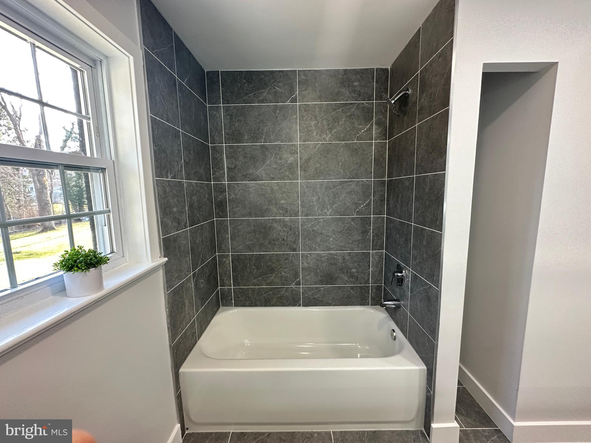 99 Elfreth Road Huntingdon Valley, PA 19006 - Photo 16 of 29 Tiled bathroom