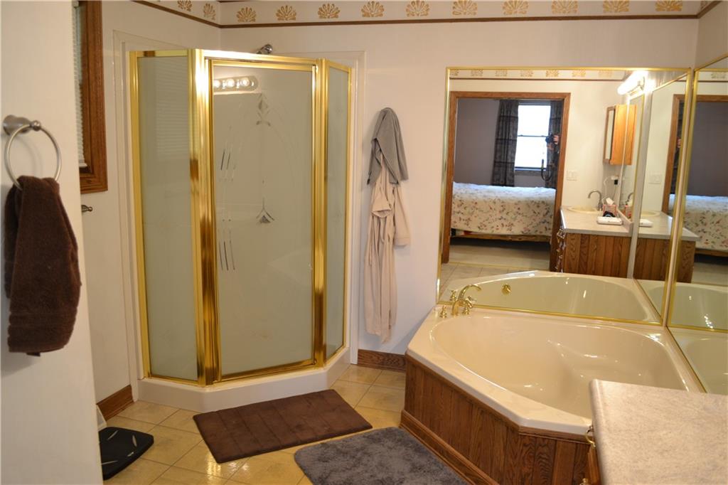 452 White Road Normalville, PA 15469 - Photo 23 of 50 a bath tub sitting next to a bathroom sink