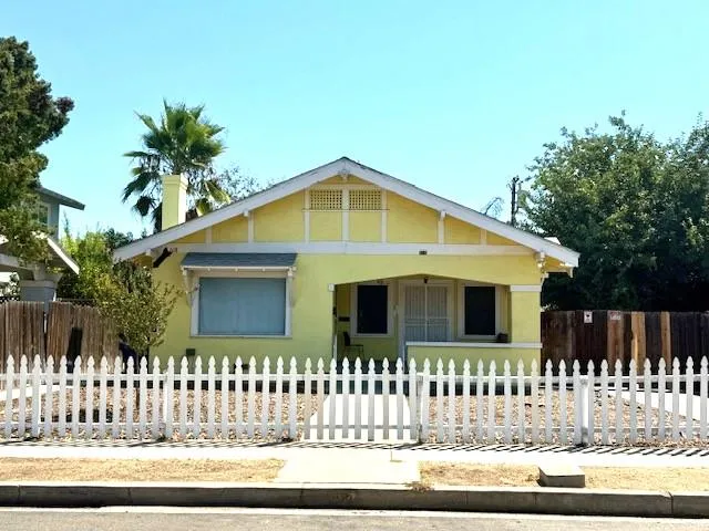 a front view of a house with a porch