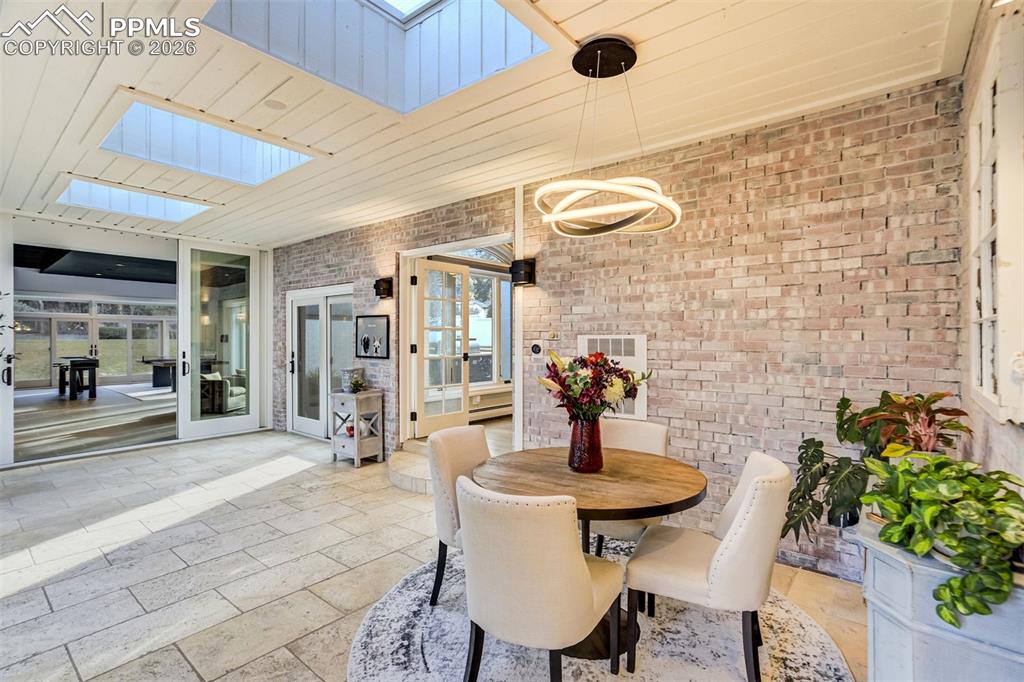 17 Pourtales Road Colorado Springs, CO 80906 - Photo 12 of 50 a view of a patio with table and chairs
