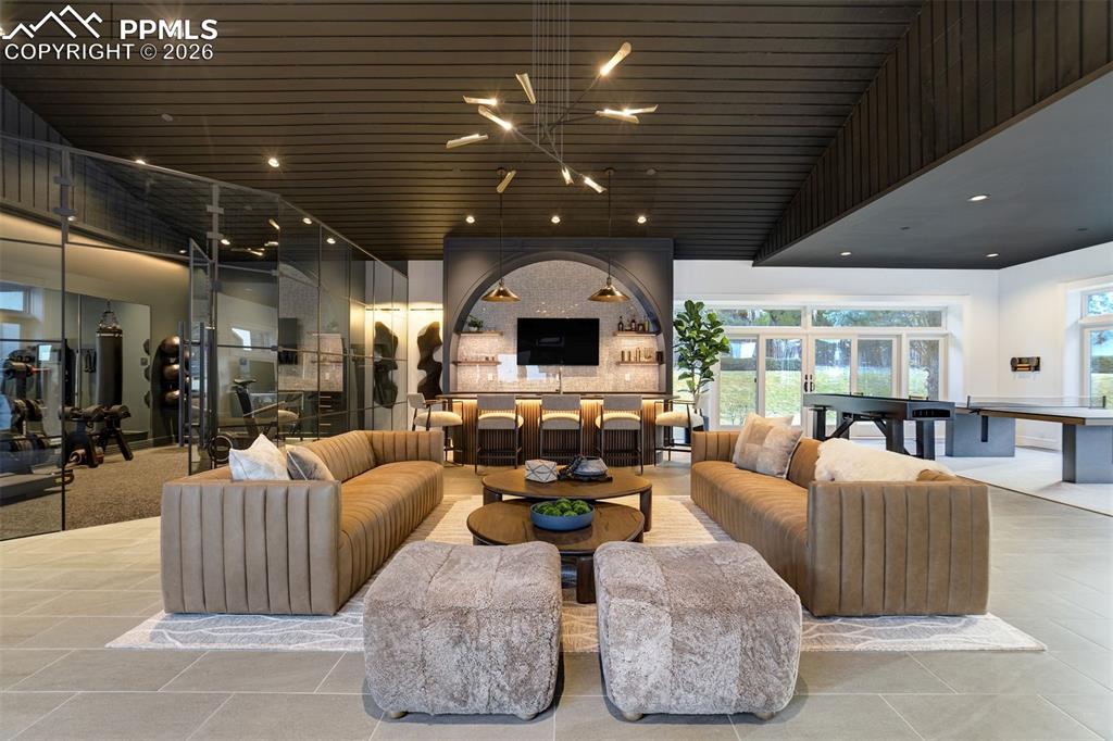 17 Pourtales Road Colorado Springs, CO 80906 - Photo 14 of 50 a living room with couches and a fireplace