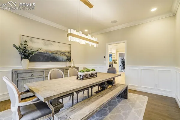 a very nice looking room with a table and chairs