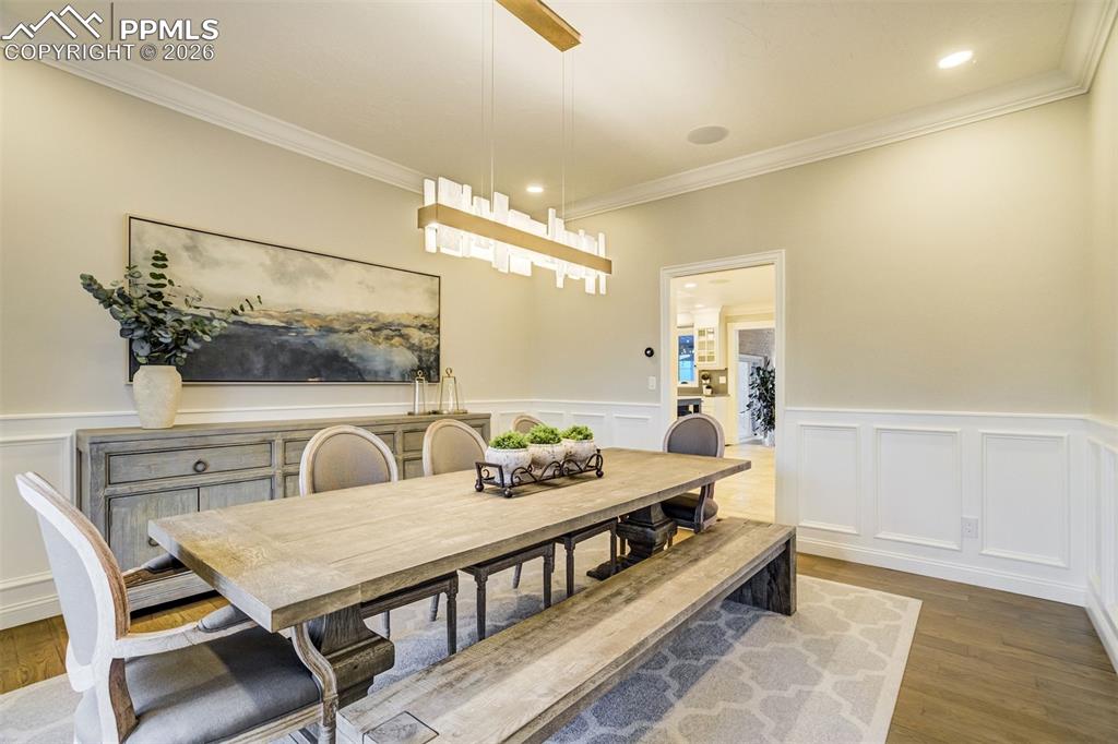 17 Pourtales Road Colorado Springs, CO 80906 - Photo 25 of 50 a very nice looking room with a table and chairs