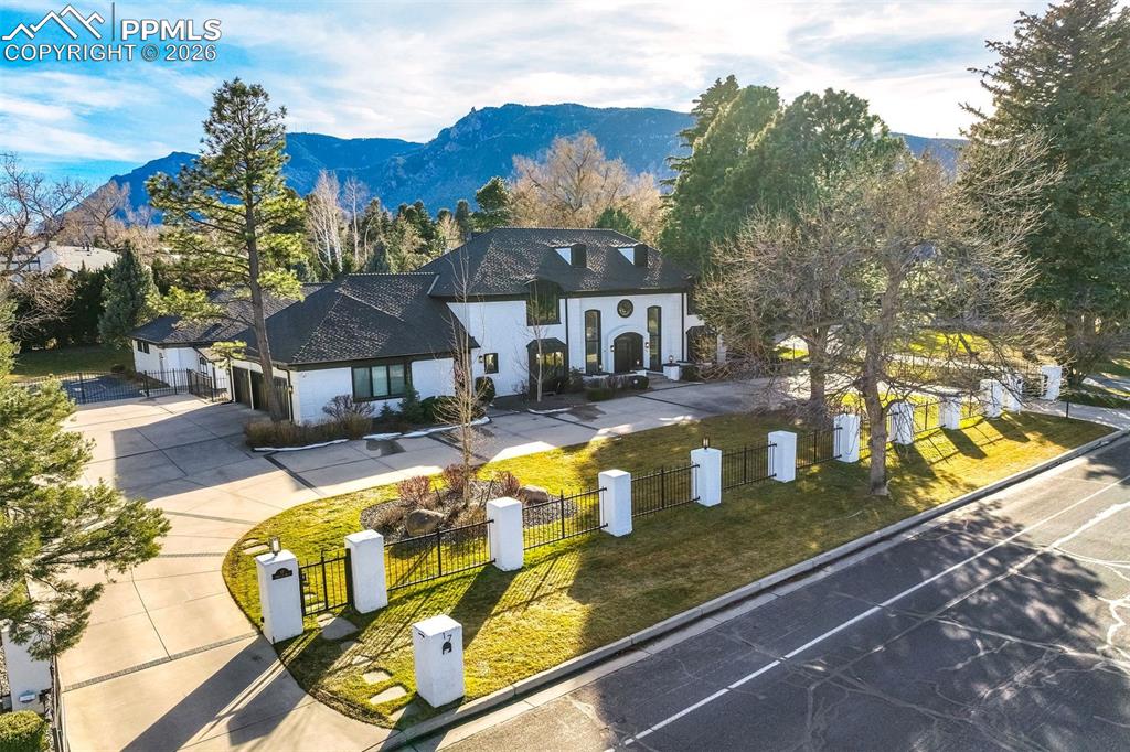 17 Pourtales Road Colorado Springs, CO 80906 - Photo 4 of 50 a view of a house with pool and chairs