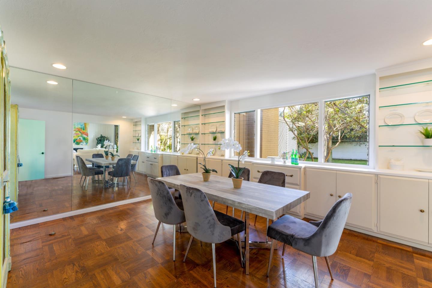 175 Isabella Avenue Atherton, CA 94027 - Photo 12 of 38 a view of a dining room with furniture window and outside view