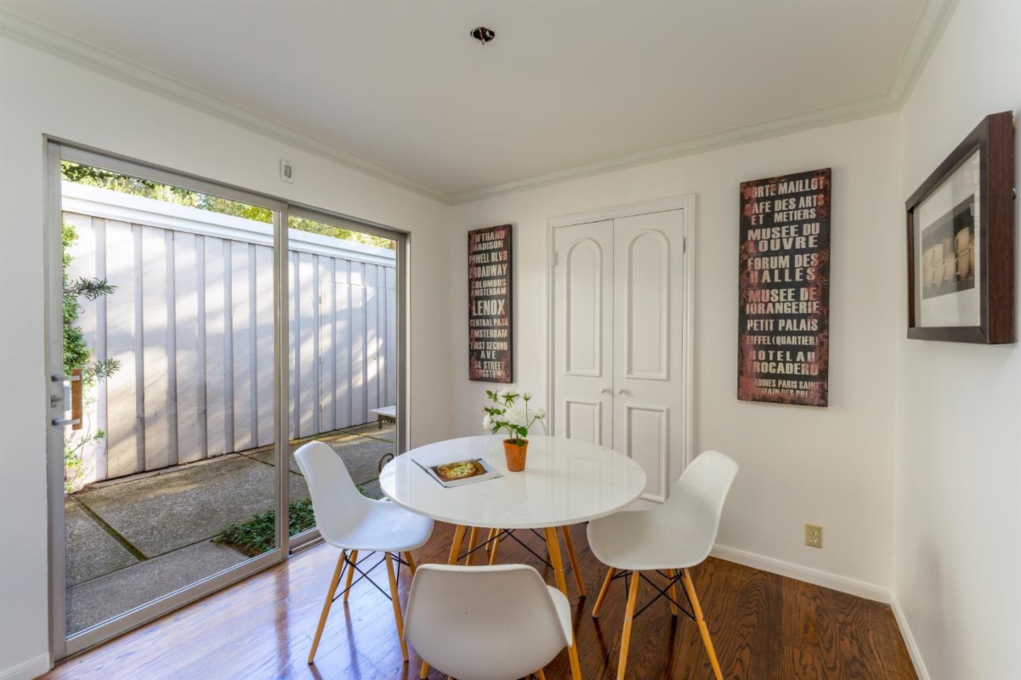 175 Isabella Avenue Atherton, CA 94027 - Photo 15 of 38 a view of a dining room with furniture window and wooden floor