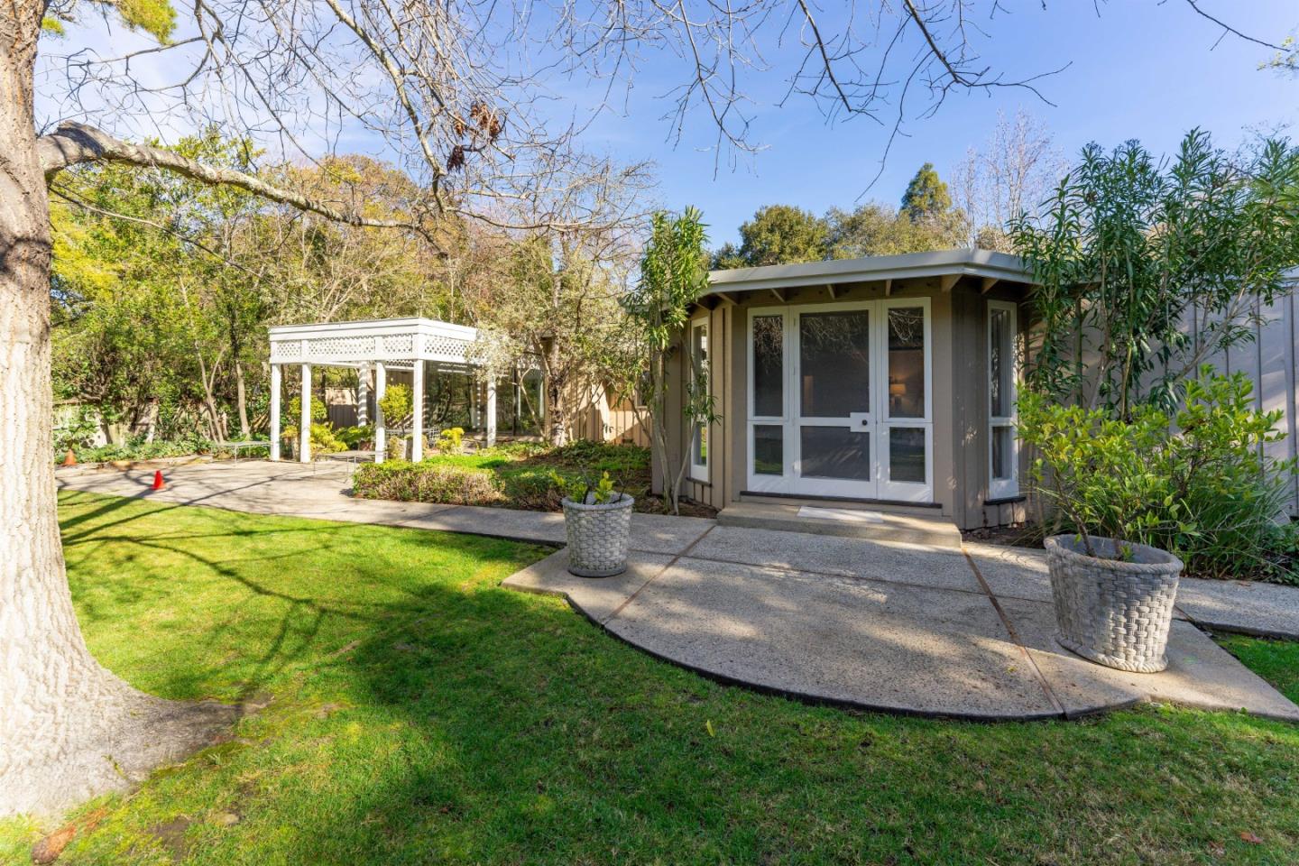175 Isabella Avenue Atherton, CA 94027 - Photo 28 of 38 front view of a house with a yard