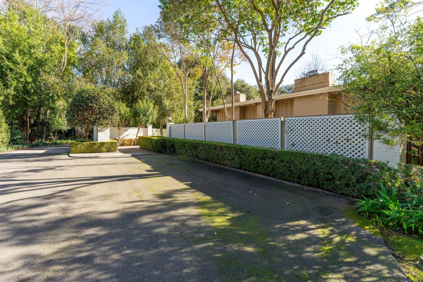 175 Isabella Avenue Atherton, CA 94027 - Photo 5 of 38 a view of a yard with plants and trees