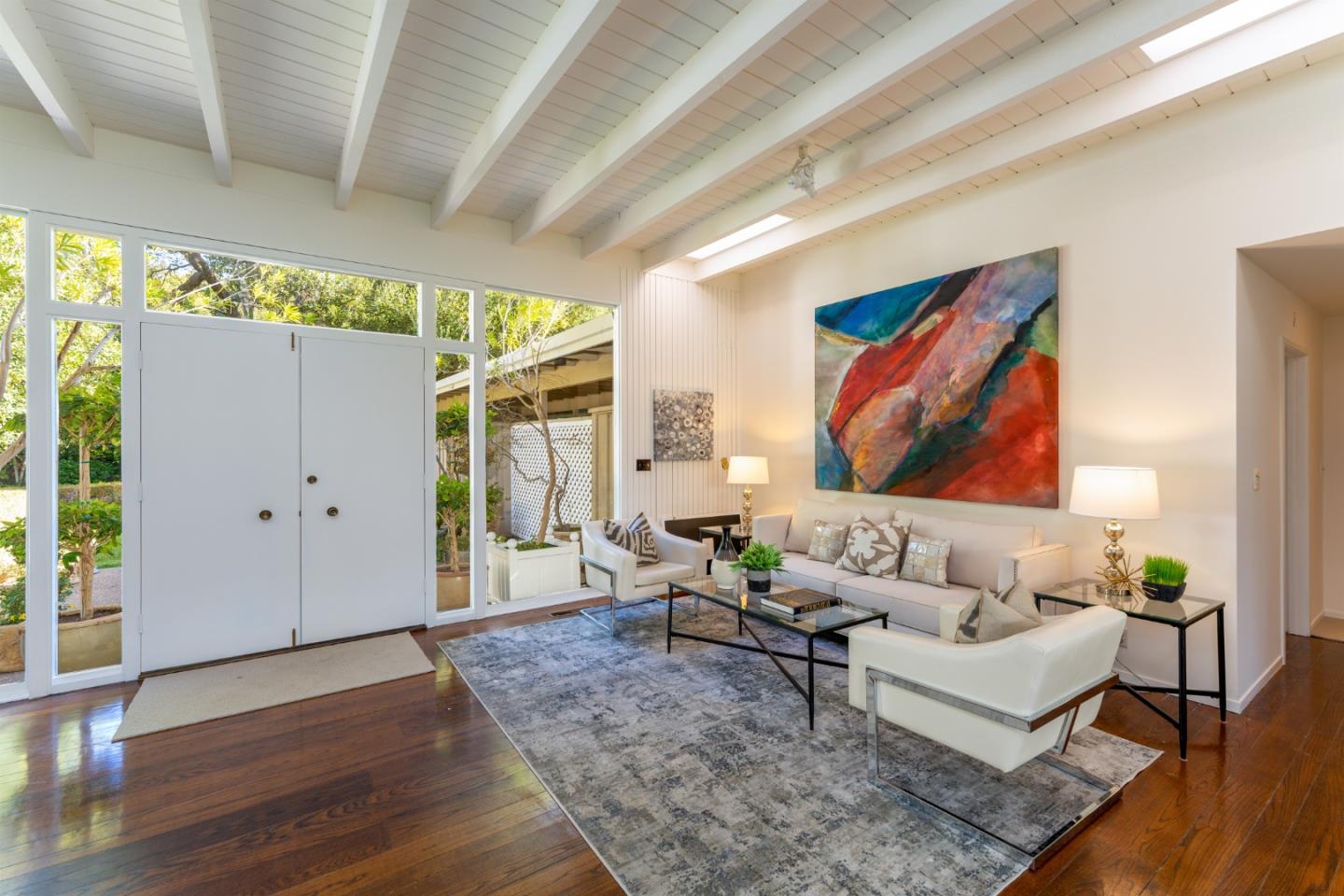 175 Isabella Avenue Atherton, CA 94027 - Photo 8 of 38 a living room with furniture and wooden floor