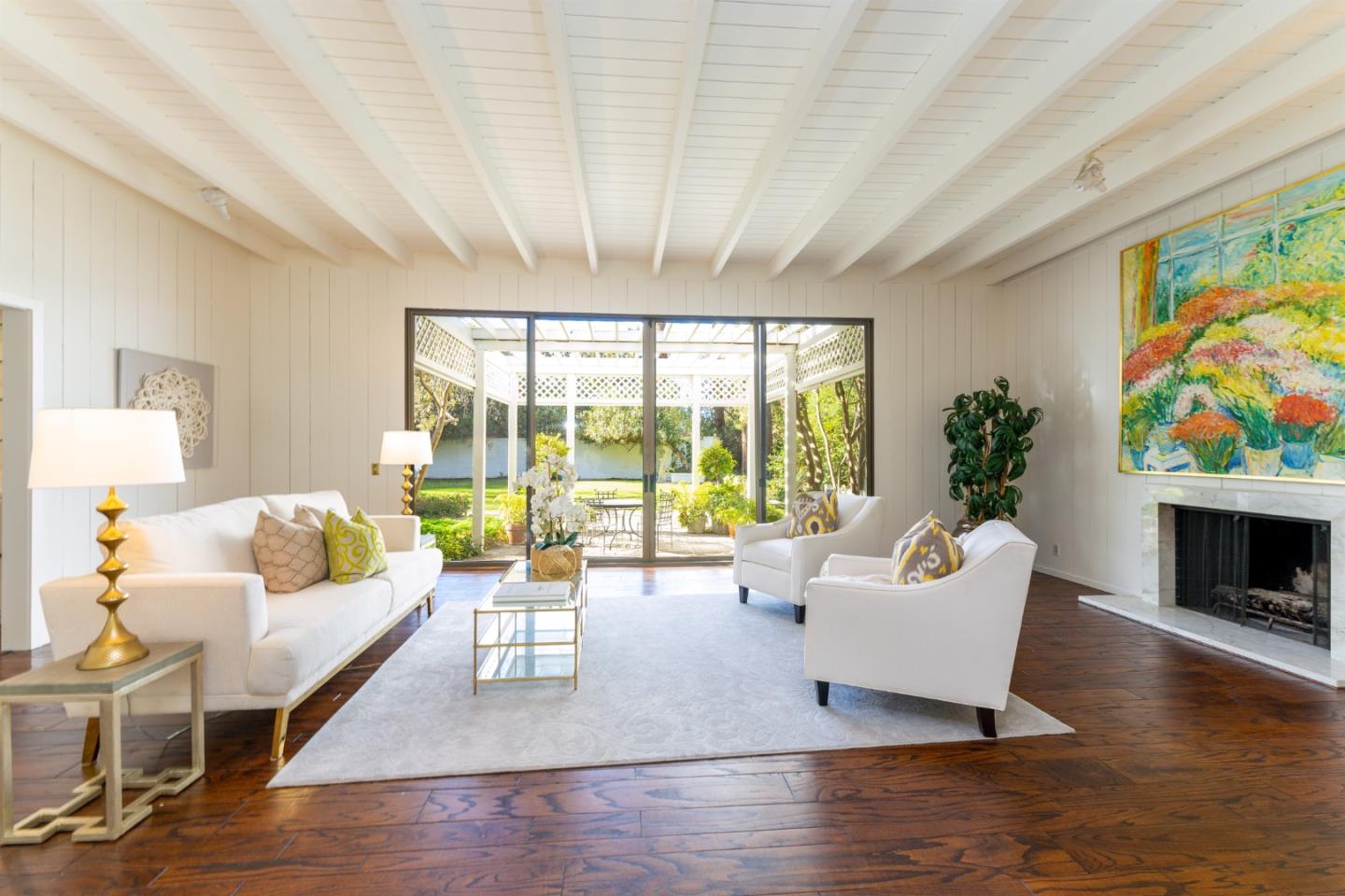 175 Isabella Avenue Atherton, CA 94027 - Photo 10 of 38 a living room with fireplace furniture and a large window