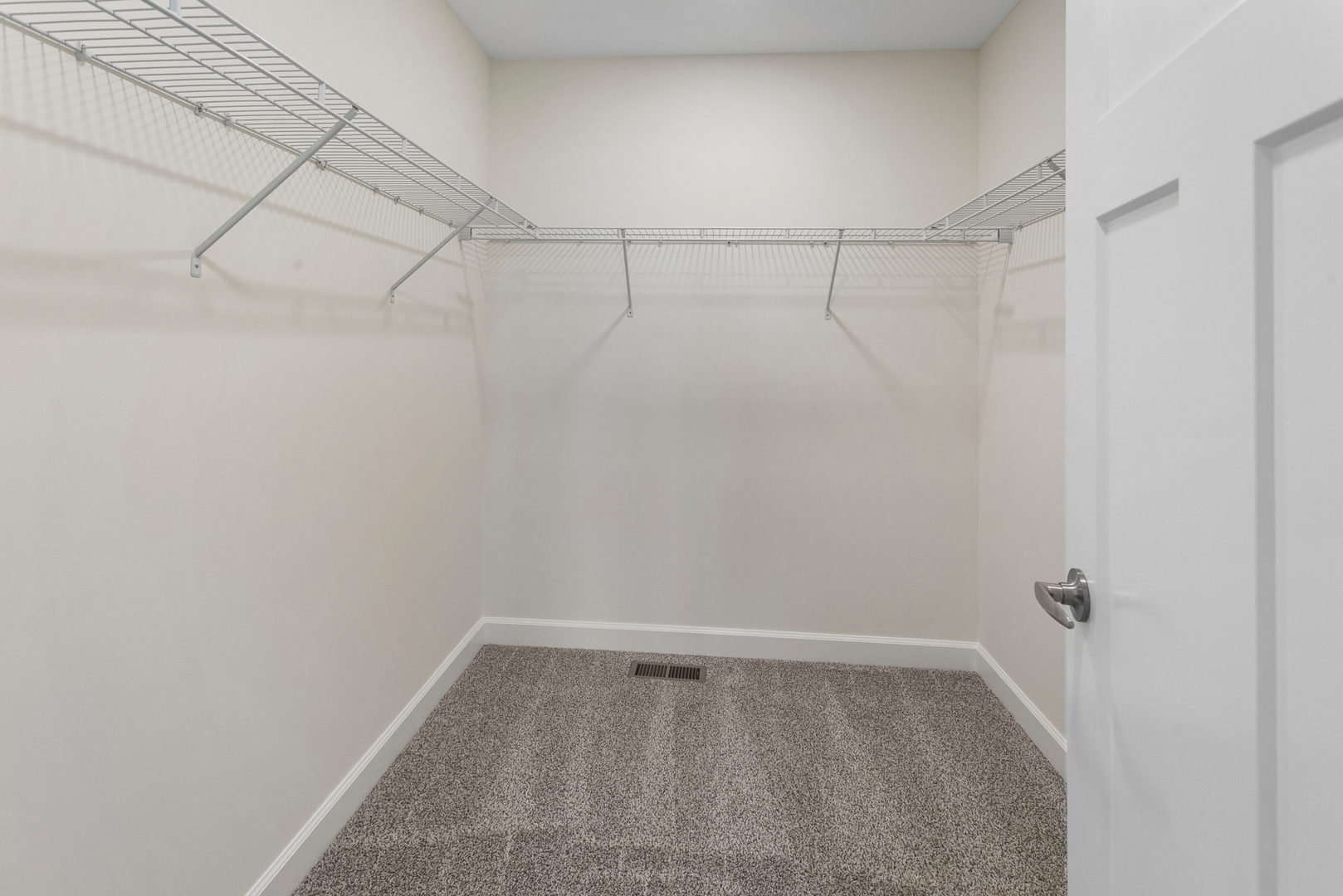 504 Patterson Drive Bloomington, IL 61701 - Photo 15 of 26 a view of a room with racks on the wall