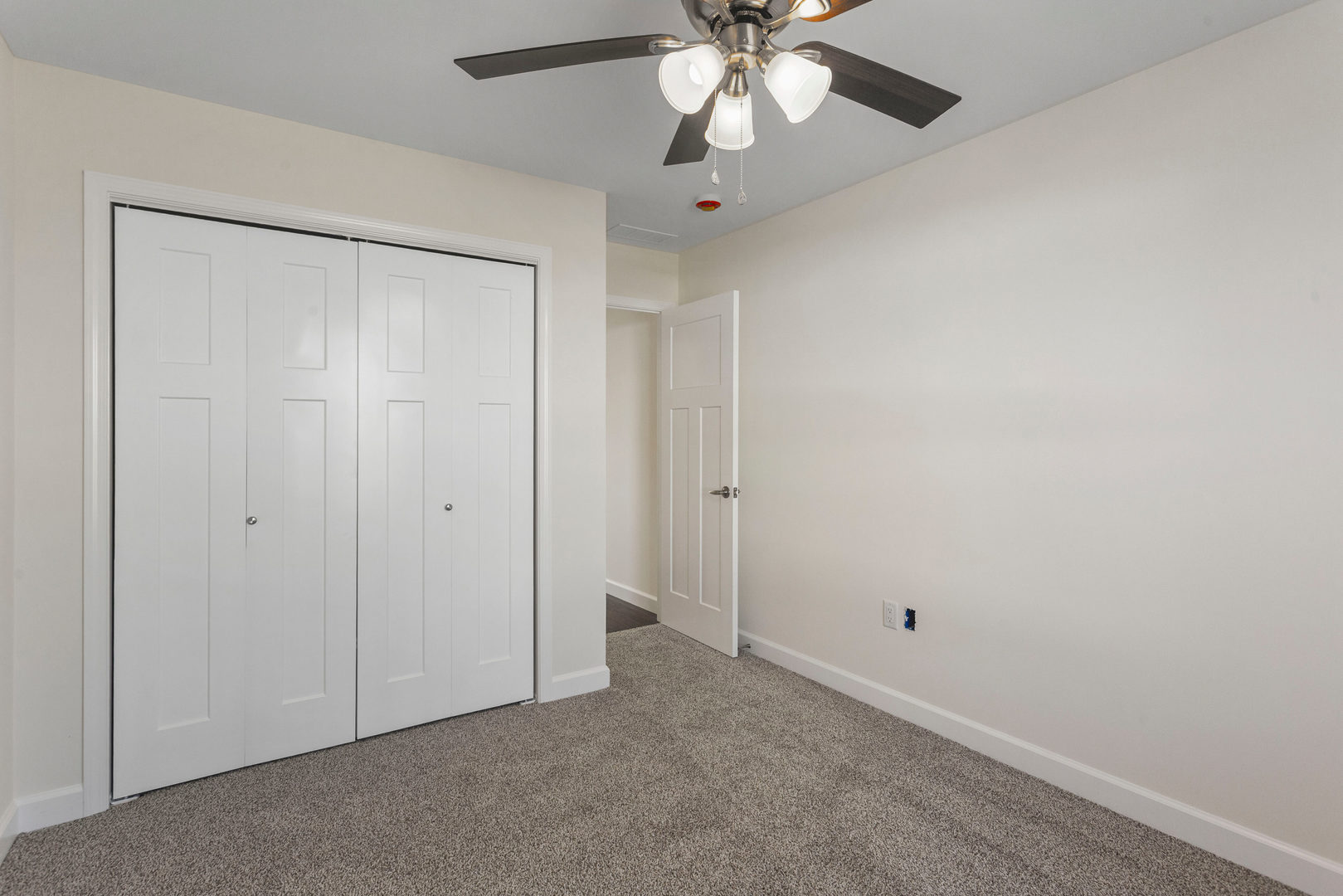 504 Patterson Drive Bloomington, IL 61701 - Photo 19 of 26 an empty room with a fan & a fan