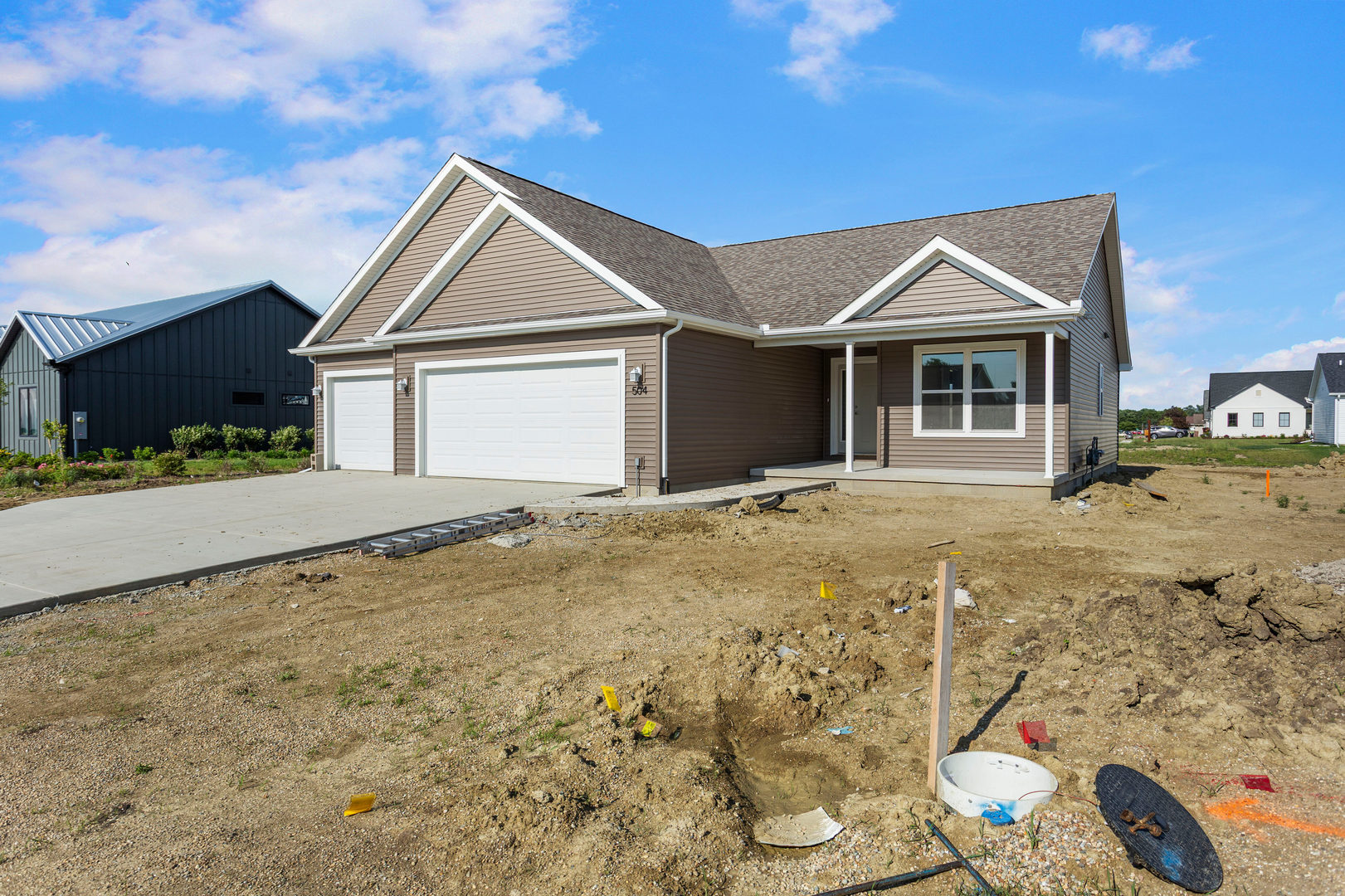 504 Patterson Drive Bloomington, IL 61701 - Photo 2 of 26 a view of a house with a yard