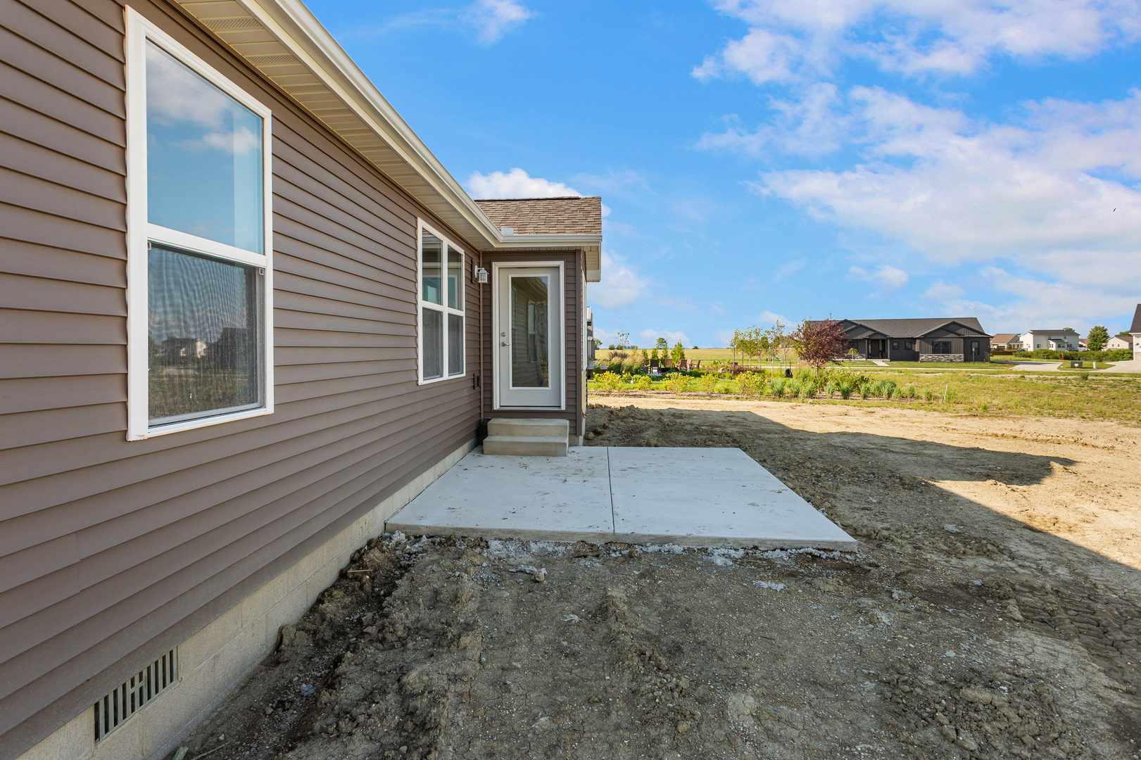 504 Patterson Drive Bloomington, IL 61701 - Photo 24 of 26 a view of a street with an ocean view