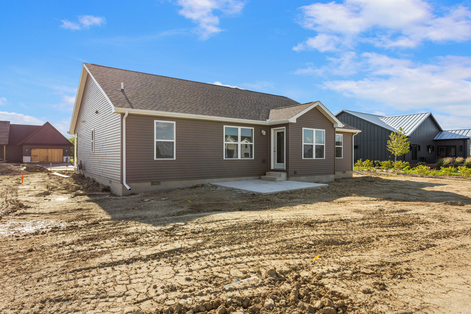 504 Patterson Drive Bloomington, IL 61701 - Photo 25 of 26 a front view of a house with a yard