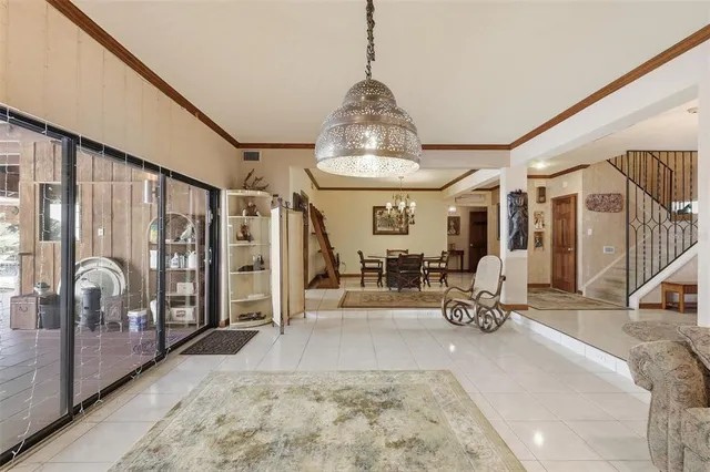a kitchen with stainless steel appliances granite countertop sink stove and refrigerator