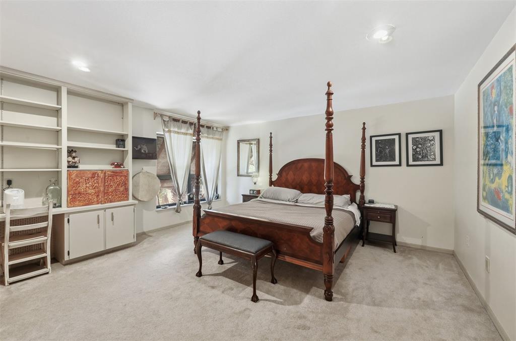 1066 Conover Street Port Charlotte, FL 33952 - Photo 45 of 80 a bedroom with a bed and a window