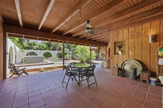 an aerial view of residential houses with city view