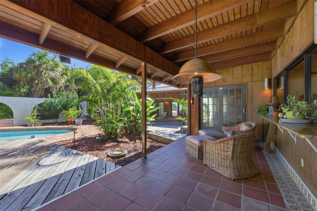 1066 Conover Street Port Charlotte, FL 33952 - Photo 53 of 80 a outdoor space with lots of potted plants