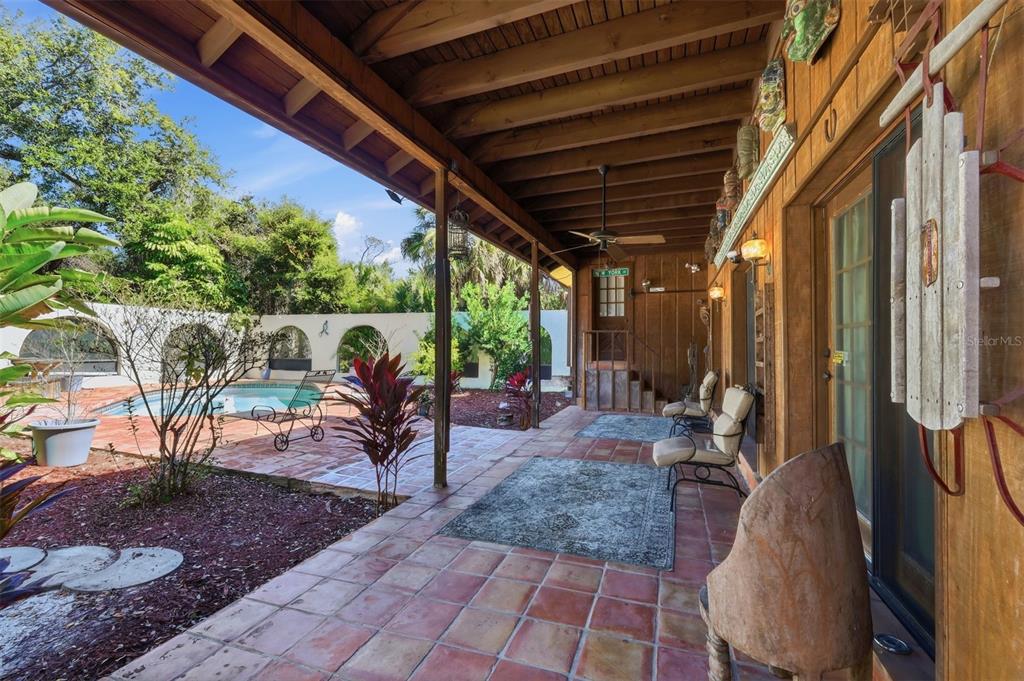 1066 Conover Street Port Charlotte, FL 33952 - Photo 60 of 80 a view of outdoor space yard deck patio and swimming pool