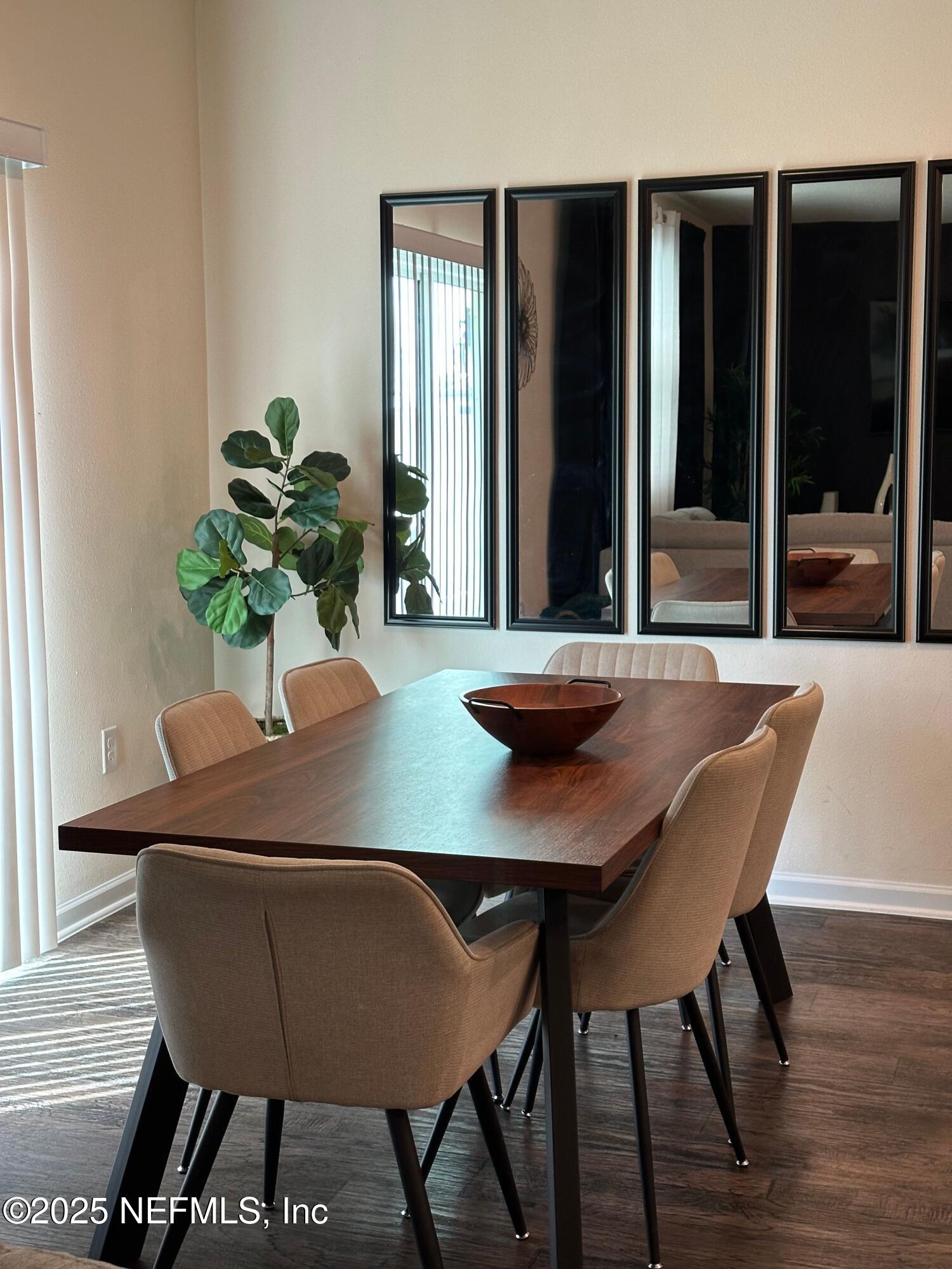 2062 Garrison Way Green Cove Springs Green Cove Springs, FL 32043 - Photo 16 of 56 a view of a dining room with furniture and window