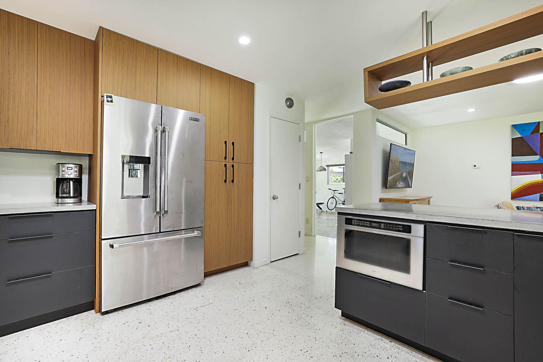400 Northwest 6th Avenue Boca Raton, FL 33432 - Photo 11 of 44 a kitchen with stainless steel appliances granite countertop a refrigerator and a stove