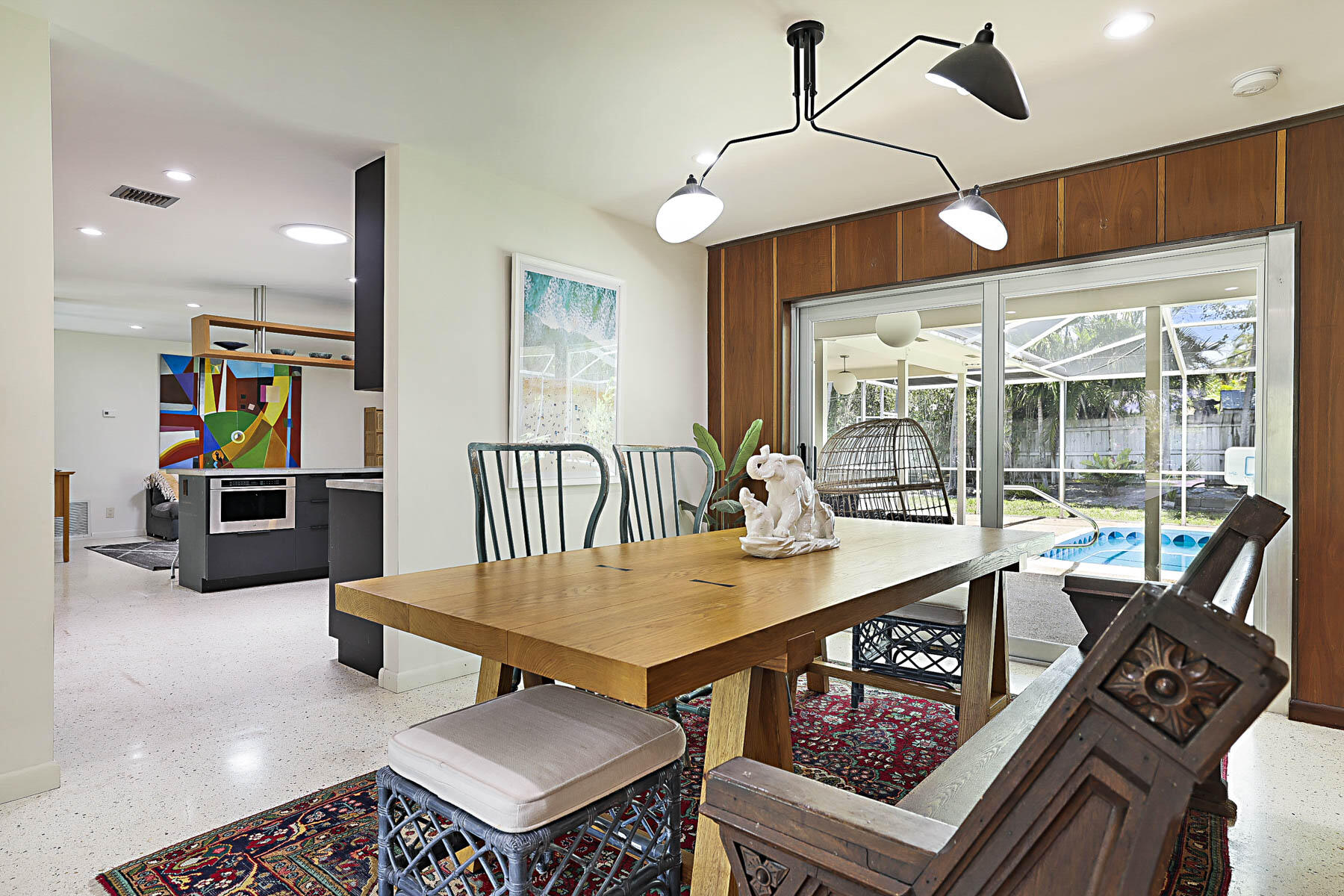 400 Northwest 6th Avenue Boca Raton, FL 33432 - Photo 14 of 44 a living room with furniture a rug and a floor to ceiling window