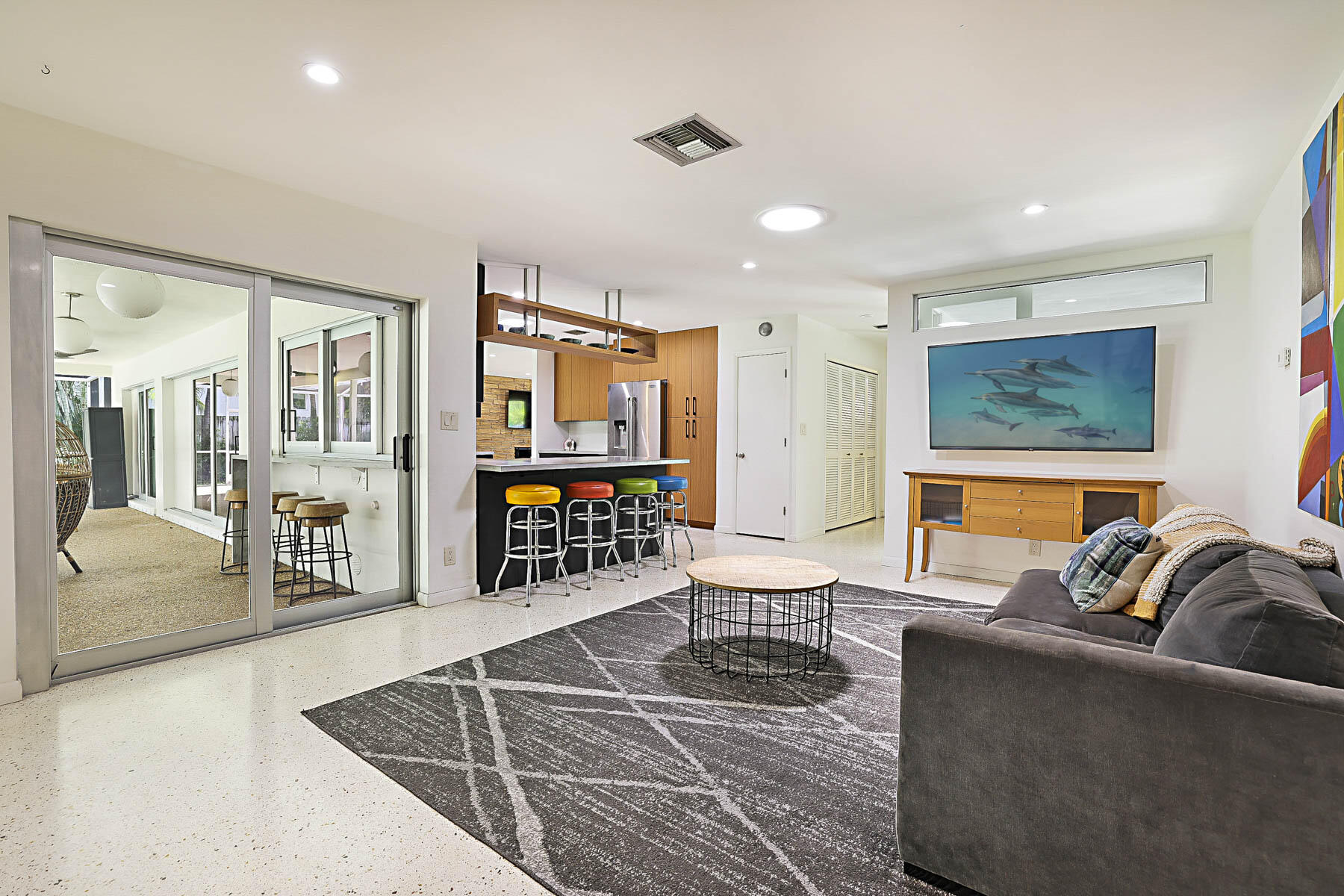 400 Northwest 6th Avenue Boca Raton, FL 33432 - Photo 15 of 44 a living room with furniture and a flat screen tv