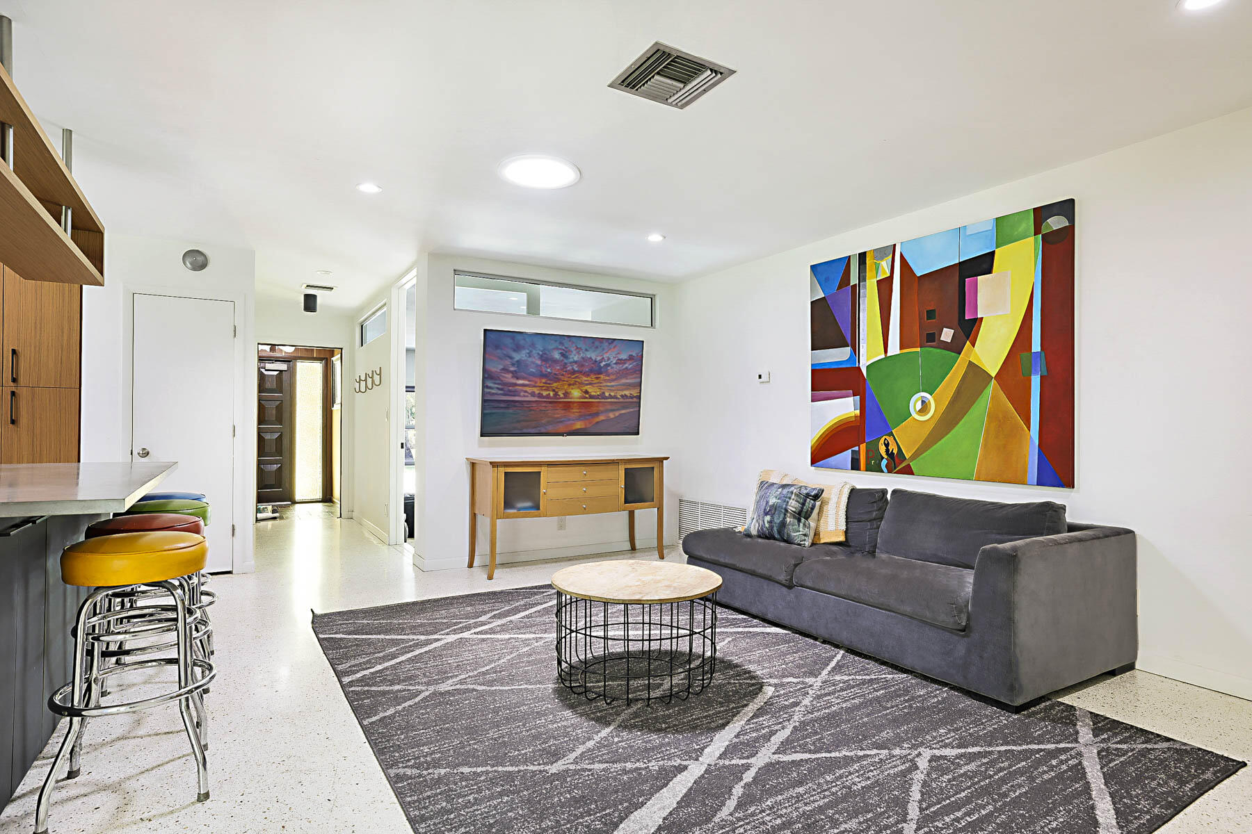 400 Northwest 6th Avenue Boca Raton, FL 33432 - Photo 16 of 44 a living room with furniture and painting on the wall