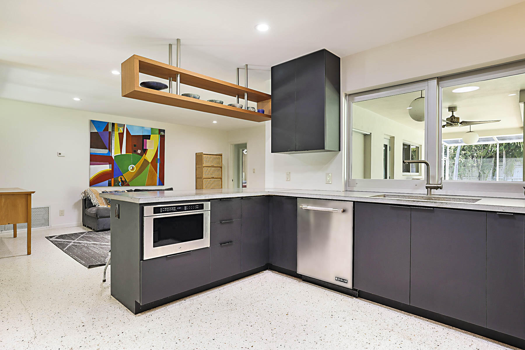 400 Northwest 6th Avenue Boca Raton, FL 33432 - Photo 2 of 44 a kitchen with stainless steel appliances granite countertop a stove and a sink