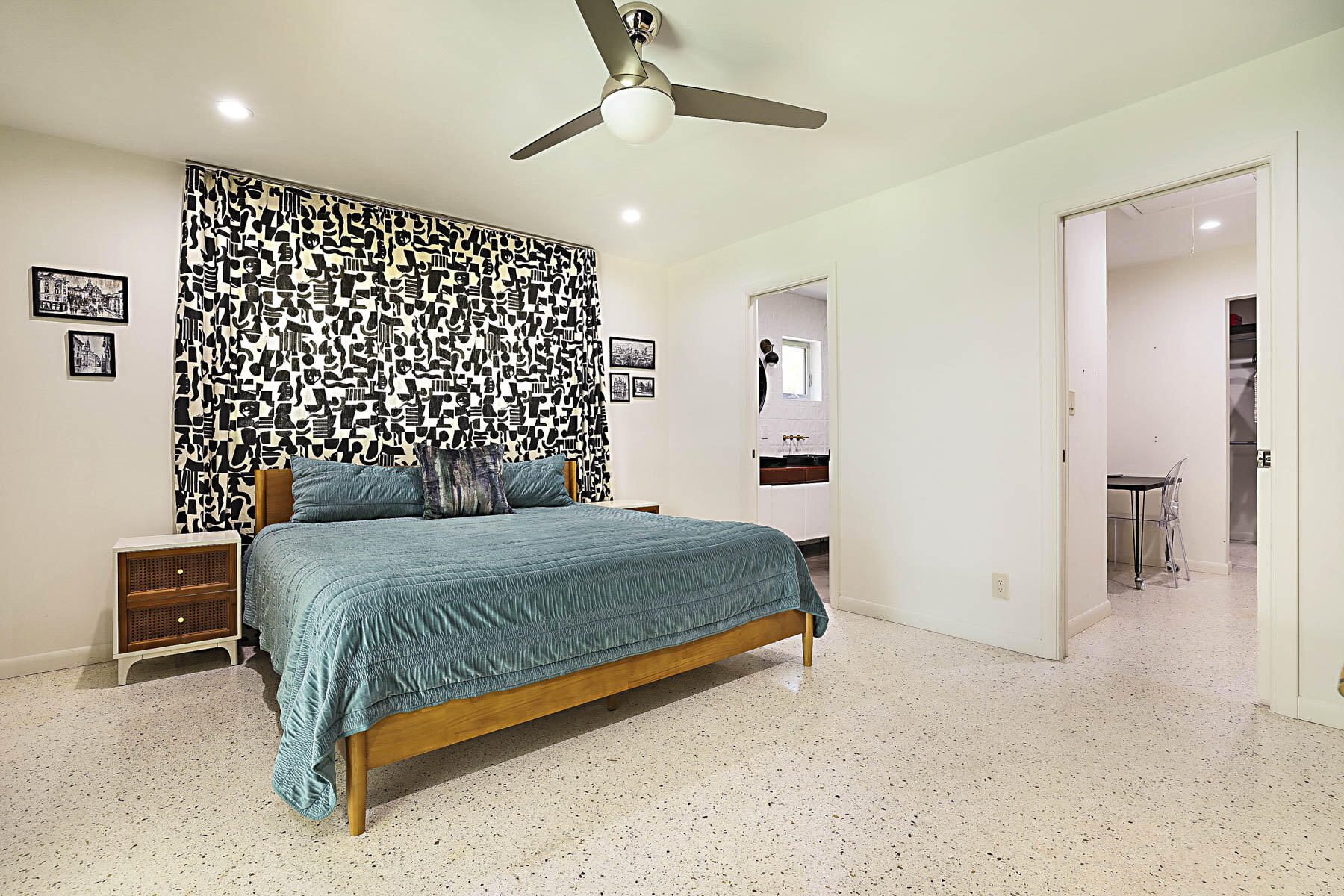 400 Northwest 6th Avenue Boca Raton, FL 33432 - Photo 21 of 44 a bedroom with a bed and a view of bathroom
