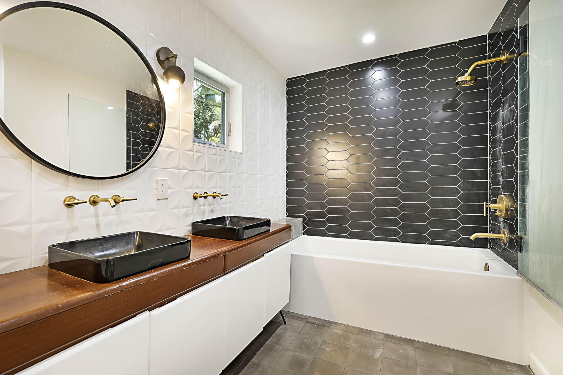 400 Northwest 6th Avenue Boca Raton, FL 33432 - Photo 22 of 44 a bathroom with a sink and a bathtub