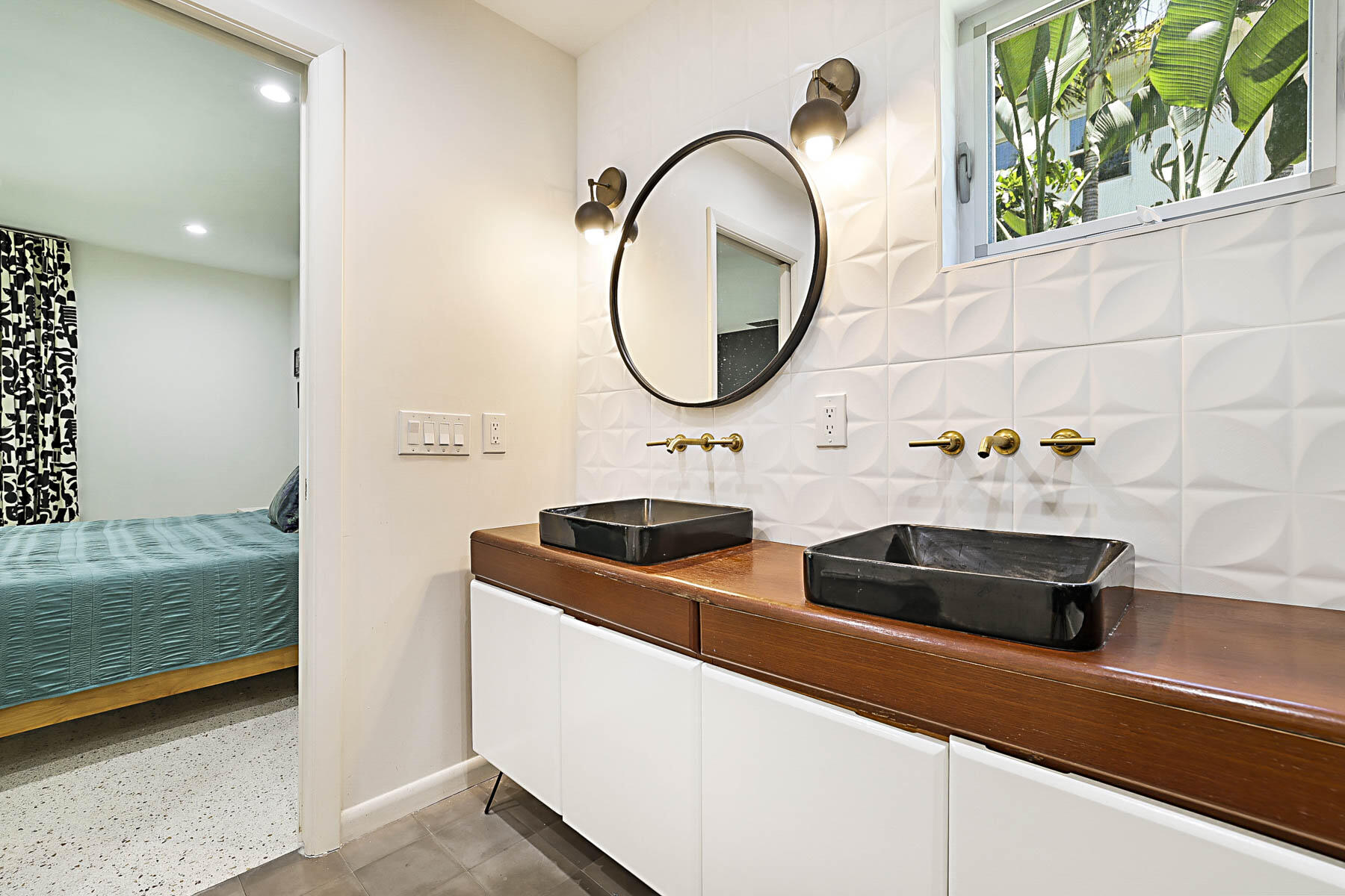 400 Northwest 6th Avenue Boca Raton, FL 33432 - Photo 23 of 44 a bathroom with a sink and a mirror