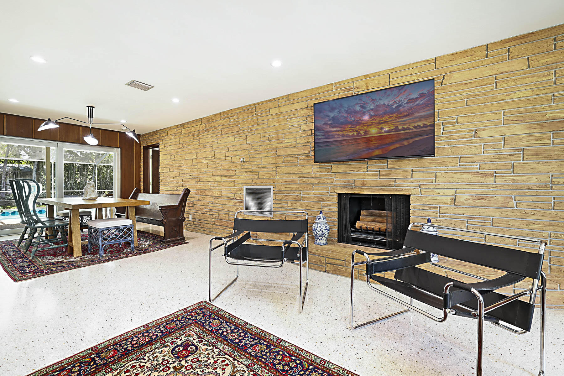 400 Northwest 6th Avenue Boca Raton, FL 33432 - Photo 3 of 44 a living room with furniture a rug and a fireplace