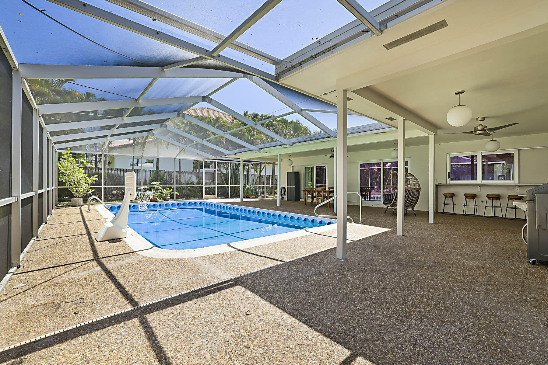 400 Northwest 6th Avenue Boca Raton, FL 33432 - Photo 33 of 44 a view of a patio with table and chairs