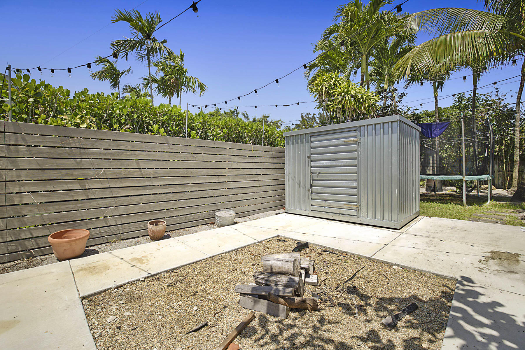 400 Northwest 6th Avenue Boca Raton, FL 33432 - Photo 41 of 44 a view of a pathway with a house in the background