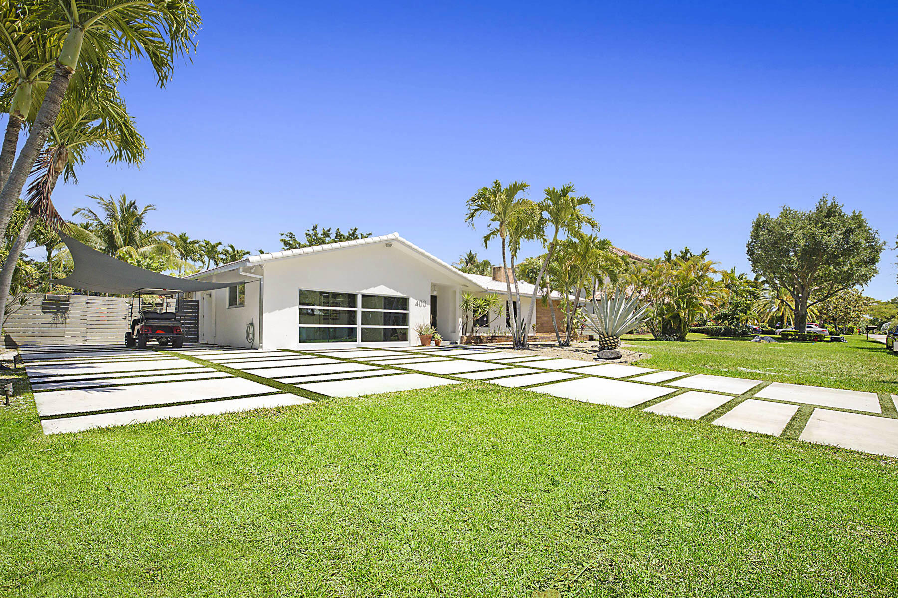 400 Northwest 6th Avenue Boca Raton, FL 33432 - Photo 43 of 44 a front view of a house with a yard